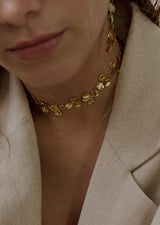 Elegant Aglaé Gold Choker Necklace with Floral Texture
