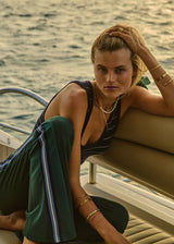 Women's Maneki Petra Flare Racing Green Pants: Eco-Viscose, Hem Splits, Taped Sides